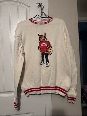 Akoo Cream Crewneck Sweater with Fox Graphic and Red Trim